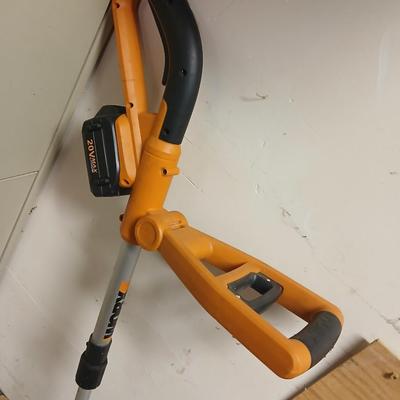 Worx 20-volt battery operated weed eater and leaf blower with 4 batteries and 1 charger