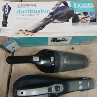 Handheld vacuum with battery and charger