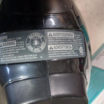 Handheld vacuum with battery and charger