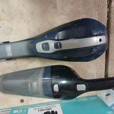 Handheld vacuum with battery and charger