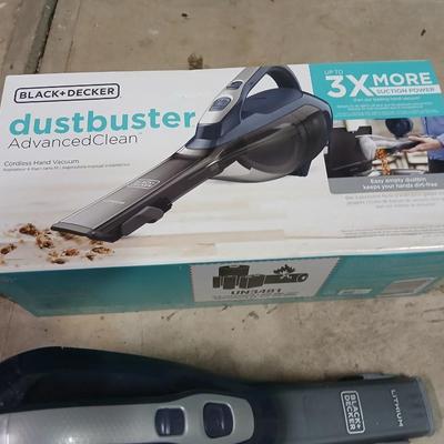 Handheld vacuum with battery and charger
