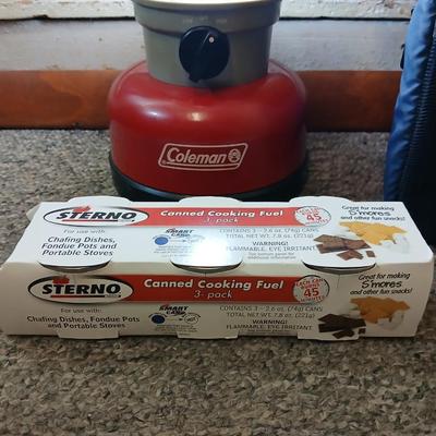 Soft sided cooler with cans of sterno and a Coleman battery operate