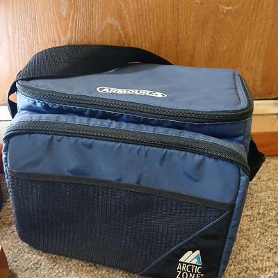Soft sided cooler with cans of sterno and a Coleman battery operate