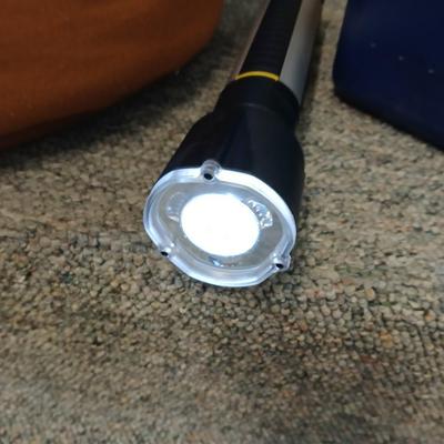 Nice sleeping bag with Stanley tri-pod flashlight and a small cooler