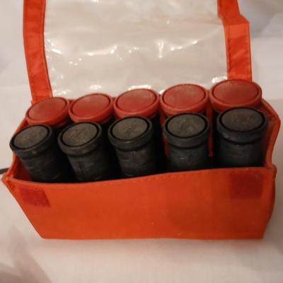 Two curling Irons, make-up travel bags and a set of electric curlers
