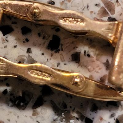 Collection of gold rings and cufflinks