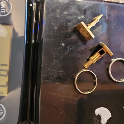 Collection of gold rings and cufflinks