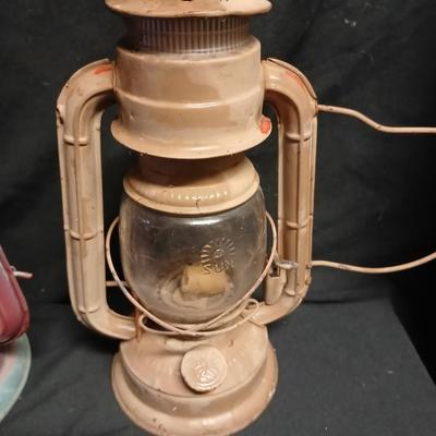 Two vintage kerosene lanterns Elephant 225 and Sun with embossed globe