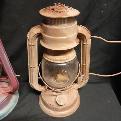 Two vintage kerosene lanterns Elephant 225 and Sun with embossed globe