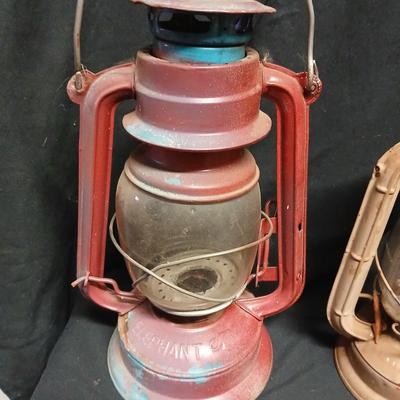Two vintage kerosene lanterns Elephant 225 and Sun with embossed globe