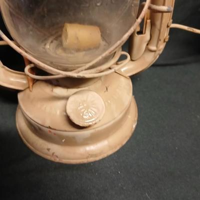Two vintage kerosene lanterns Elephant 225 and Sun with embossed globe