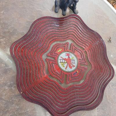 Fire department yard whirl gig with water bottle