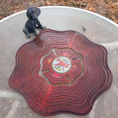 Fire department yard whirl gig with water bottle