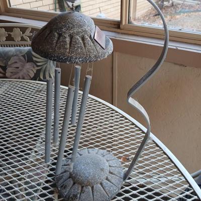 Welcome friends sign with solar powered wind chimes
