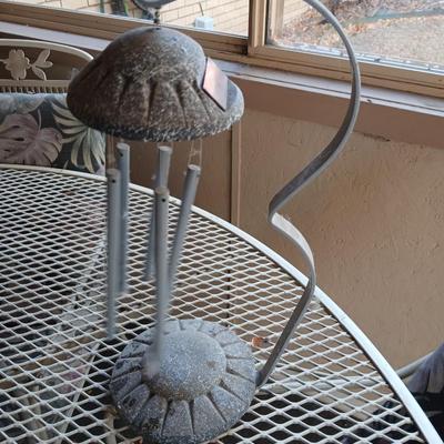 Welcome friends sign with solar powered wind chimes