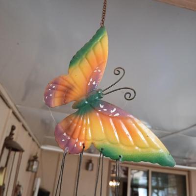 Hanging butterfly chimes and a small bird house