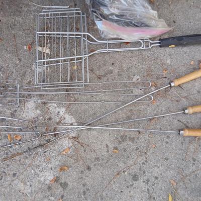 Small propane grill with grilling tools