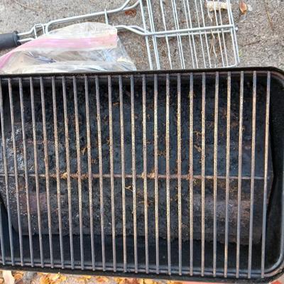 Small propane grill with grilling tools
