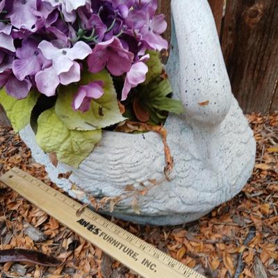 Two ceramic Geese and a swan planter
