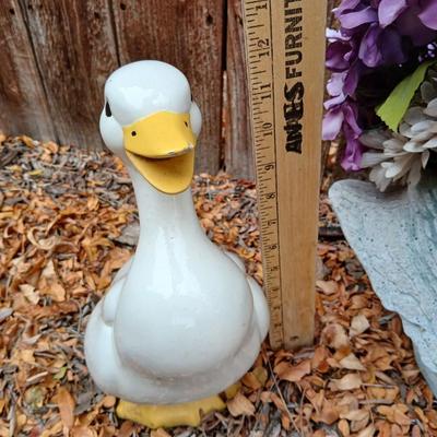 Two ceramic Geese and a swan planter