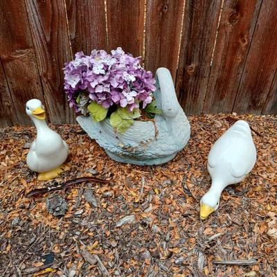 Two ceramic Geese and a swan planter