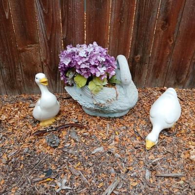 Two ceramic Geese and a swan planter