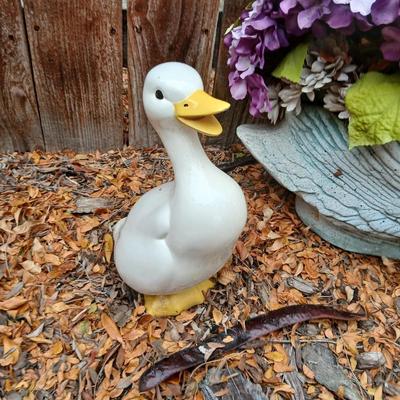 Two ceramic Geese and a swan planter