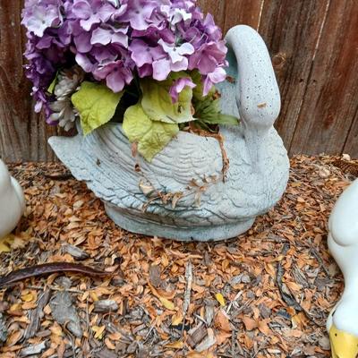 Two ceramic Geese and a swan planter