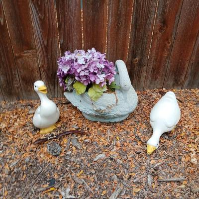 Two ceramic Geese and a swan planter