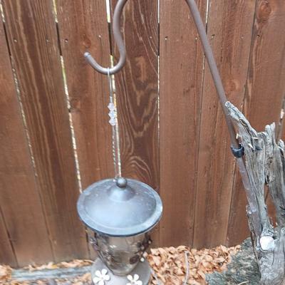 Large unique landscape trunk with hummingbird feeder