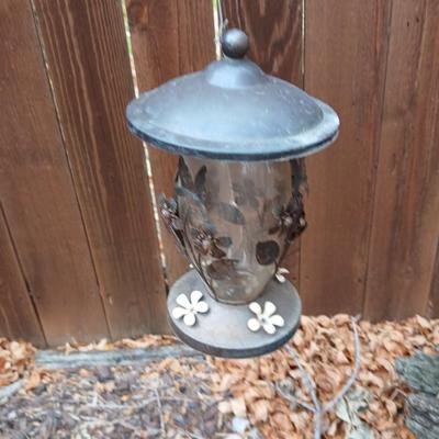 Large unique landscape trunk with hummingbird feeder