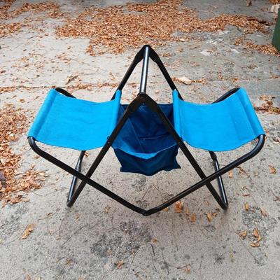 Folding bench with storage in center and a teal cooler
