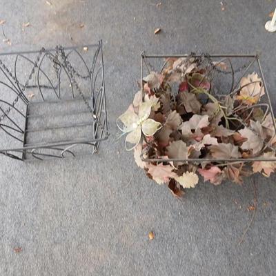 Two vintage wrought iron hanging baskets