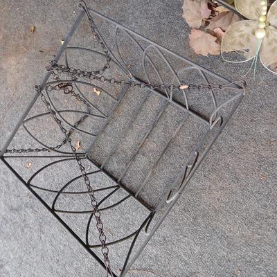 Two vintage wrought iron hanging baskets