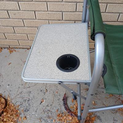 MAC folding chair with side table and a small blue cooler