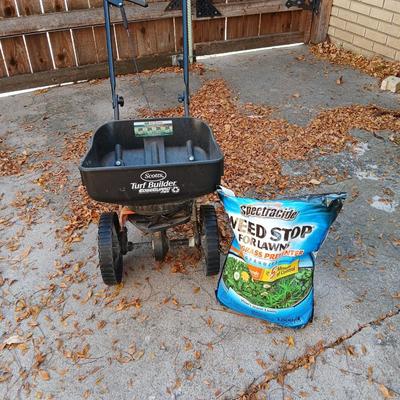 Scott's Turf Builder Edge guard spreader with bag of weed stop