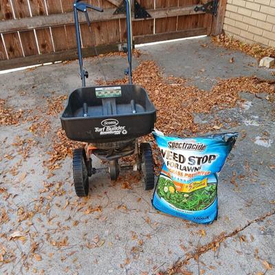 Scott's Turf Builder Edge guard spreader with bag of weed stop
