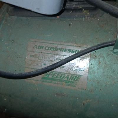 3/4 Horsepower Speedaire air compressor with hose