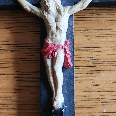 Sale Photo Thumbnail #253: This auction lot is for a Vintage Crucifix.  The cross is wood and the corpus is pot metal.  Very handsome and nicely shows its age.  See photo for size.