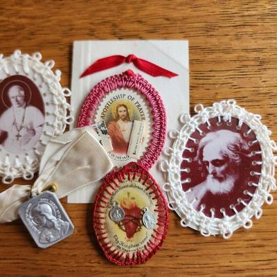 Sale Photo Thumbnail #271: This auction lot is for a grouping of Vintage Crocheted-Edge Religious Icons,  This grouping shows St. Pope Pius X, St. Joseph, two Sacred Hearts and a Christ Medal with Ribbon.