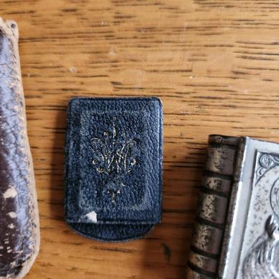 Sale Photo Thumbnail #291: This auction lot is for Three Religious Pocket Icons.  These are pocket carriers - one is a Novena and a Statue of Fatima, another is a very small Our Lady of Perpetual Help Medallion and the last is a small rosary or keepsake box with the likeness of the