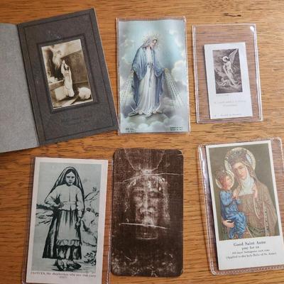 Sale Photo Thumbnail #296: This auction lot is for a grouping of Encased Religious Items. These 6 items show the likes of the Shroud of Turn, one of the Saints of Fatima, a Guardian Angel and more.  The vintage priest celebrating Mass is not encased but is included.