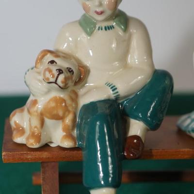 CERAMIC ARTS STUDIO - MADISON, WI 1942-1956 BOY ON BENCH W/ DOG & GIRL ON BENCH W/ CAT UNMARKED