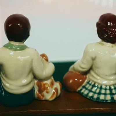 CERAMIC ARTS STUDIO - MADISON, WI 1942-1956 BOY ON BENCH W/ DOG & GIRL ON BENCH W/ CAT UNMARKED