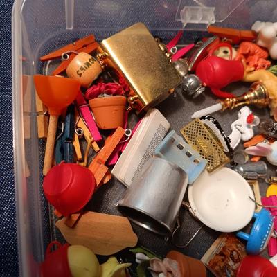 ORGANIZING CONTAINER FULL OF MINIATURE ITEMS