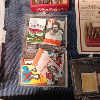 ORGANIZING CONTAINER FULL OF MINIATURE ITEMS