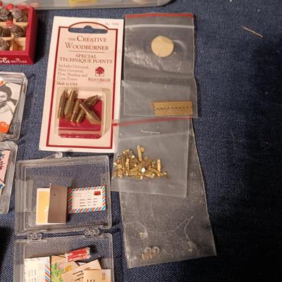 ORGANIZING CONTAINER FULL OF MINIATURE ITEMS