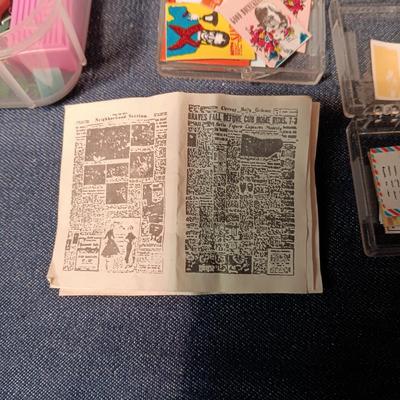 ORGANIZING CONTAINER FULL OF MINIATURE ITEMS