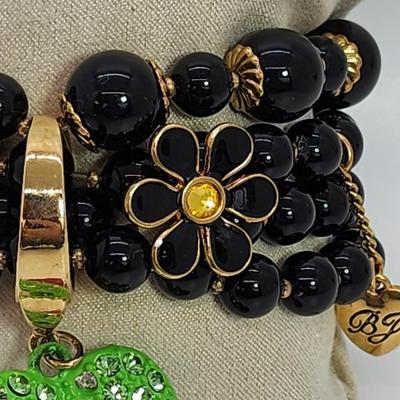 LOT 5:: Betsey Johnson Multi bead Charm Bracelet featuring Cherries, flower and lil worm has her hangtag we included a jewelry satchel