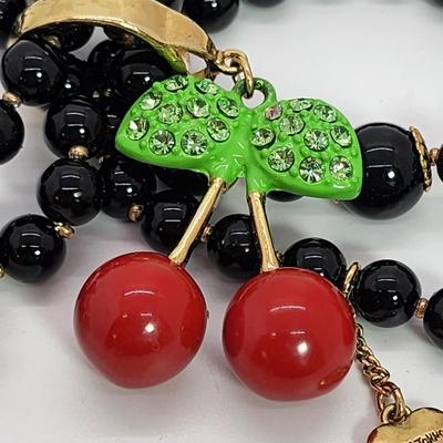 LOT 5:: Betsey Johnson Multi bead Charm Bracelet featuring Cherries, flower and lil worm has her hangtag we included a jewelry satchel